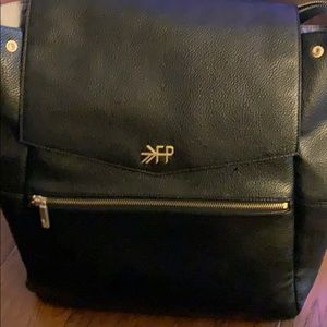 Freshly picked black leather backpack